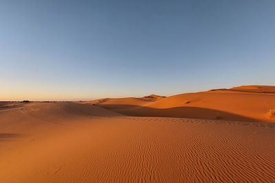 © Tawfiq Bedrane - Coucher de soleil sur les dunes de Merzouga - Maroc Coucher de soleil sur les dunes de Merzouga - Maroc