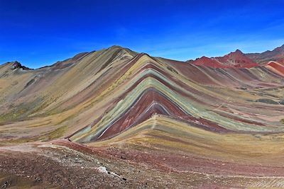 © Cicloco / iStock - Vinicunca - Massif de l'Ausangate - Région de Cusco - Pérou Vinicunca - Massif de l'Ausangate - Région de Cusco - Pérou